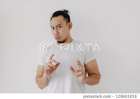 Doubt hesitate funny face man in white t-shirt isolate on white. 120681858