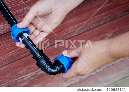 Compression clamp system with threaded nut on PP elbow fitting for connecting HDPE pipes. 120682121