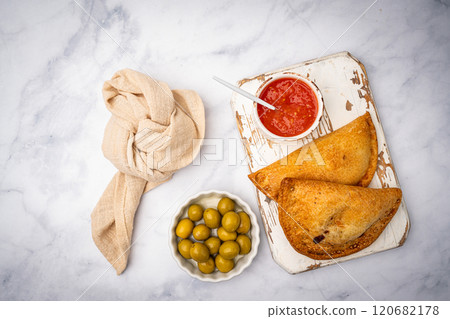 Traditional baked Spanish empanadas Traditional baked Spanish empanadas 120682178