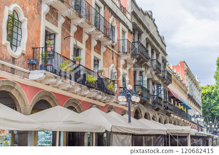 Colorful colonial streets of Puebla, Mexico. Vibrant architecture, cultural heritage, and historic charm concept 120682415