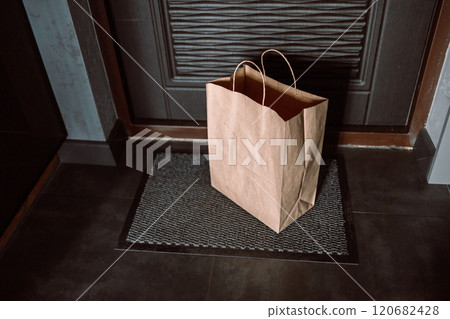 Contactless delivery. Apartment entrance with delivered box. Control Epidemic Prevention measures of coronavirus 120682428