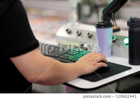 operator controls modern computerized equipment operator controls modern computerized equipment 120682441