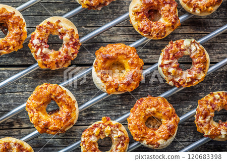 Mini pizza bagels on wooden table. Top view. 120683398