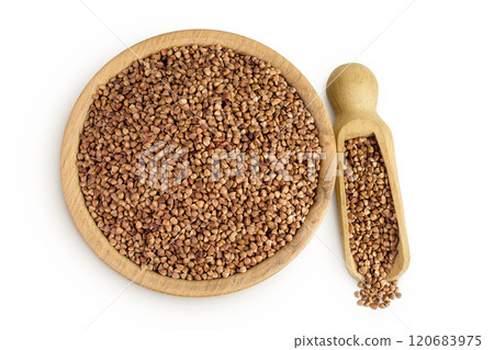 Raw buckwheat in wooden bowl isolated on white background. Top view. Flat lay 120683975