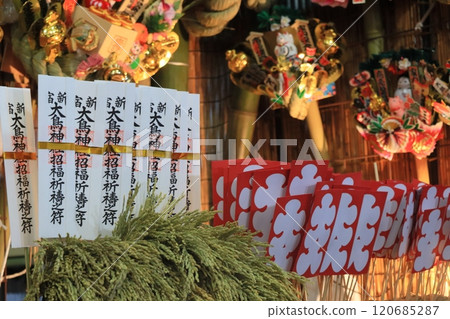 Tori-no-ichi: Auspicious rakes - A stall displaying auspicious rakes Tori-no-ichi: Auspicious rakes - A stall displaying auspicious rakes 120685287