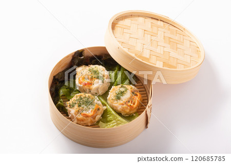 Chicken shumai with tomato and mozzarella Chicken shumai with tomato and mozzarella 120685785
