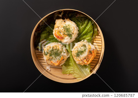 Chicken shumai with tomato and mozzarella 120685787