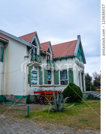 Restaurant in an antique building. The building is in the form of a mill. Batumi architecture. Catering business 120686057