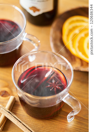 Mulled wine with orange and cinnamon 120686344
