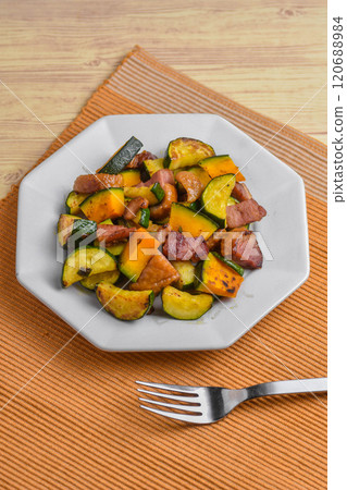 Stir-fried duck with zucchini and pumpkin Stir-fried duck with zucchini and pumpkin 120688984