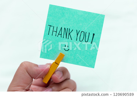 Business appreciation event thank you gesture in creative office space engaging atmosphere close-up perspective on gratitude 120690589