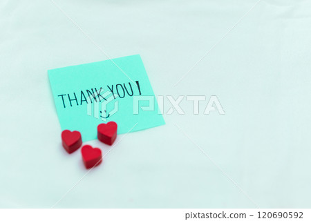 Gratitude gesture simple thank you note home office business acknowledgment cozy environment close-up heartfelt communication Gratitude gesture simple thank you note home office business acknowledgment cozy environment close-up heartfelt communication 120690592