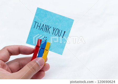 Thank you note handheld gesture home office social media content indoor close-up shot business appreciation concept 120690624