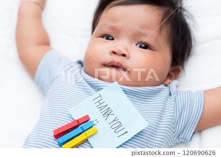 Celebrating milestones baby thank you note home family moment cozy setting close-up view business appreciation Celebrating milestones baby thank you note home family moment cozy setting close-up view business appreciation 120690626