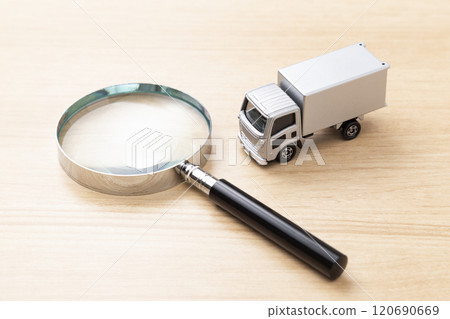 Truck and magnifying glass Truck and magnifying glass 120690669