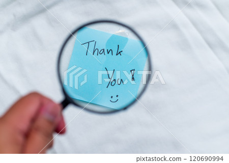 Business appreciation event thank you note office desk note taking professional environment close-up view gratitude concept Business appreciation event thank you note office desk note taking professional environment close-up view gratitude concept 120690994