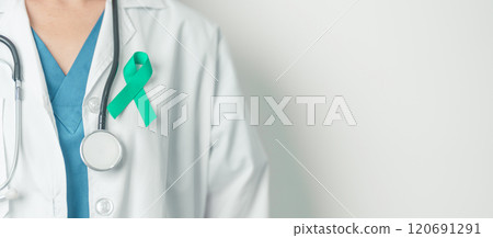Doctor holding Teal Ribbon for January Cervical Cancer Awareness month. Uterus and Ovaries, Cervix, Endometriosis, Hysterectomy, Uterine fibroids, Reproductive, Healthcare and World cancer day Doctor holding Teal Ribbon for January Cervical Cancer Awareness month. Uterus and Ovaries, Cervix, Endometriosis, Hysterectomy, Uterine fibroids, Reproductive, Healthcare and World cancer day 120691291