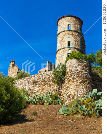 Ruins of ancient fortified Grimaud castle on hill, France 120691820