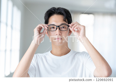 Young man with glasses 120692091