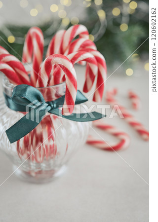 Christmas candy canes in a glass jars closeup 120692162