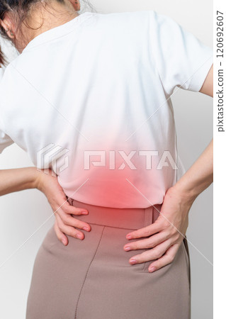 adult female with muscle pain on gray background. Elderly woman having back body ache due to Piriformis Syndrome, Low Back Pain and Spinal Compression. Office syndrome and medical concept 120692607