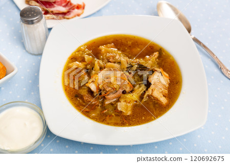 Russian dish Shchi - sour cabbage soup served in bowl 120692675
