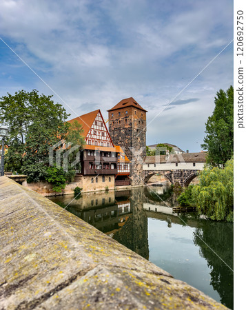 Historical old town with view of Henkerturm tower 120692750