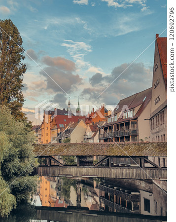 Hangmans Bridge Henkersteg in old town of Nuremberg at sunset. Hangmans Bridge Henkersteg in old town of Nuremberg at sunset. 120692796