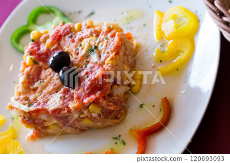 Timbale from tomatoes and canned tuna 120693093