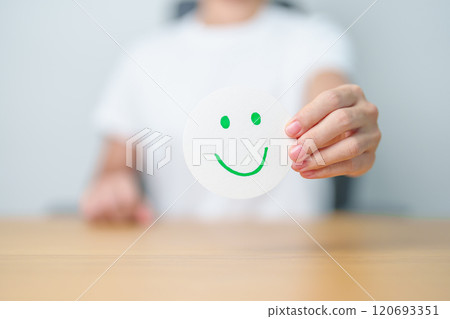 Woman show Happy Smile face paper, Mental health Assessment, Psychology, Health Wellness, Feedback, Customer Review, Experience, Satisfaction Survey, Positive Thinking and World Mental Health day 120693351