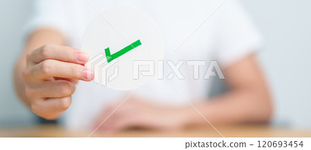 Woman show Right symbol paper. True and false, accept and rejected, evaluation, Vote, Poll, Yes or No and Survey concepts Woman show Right symbol paper. True and false, accept and rejected, evaluation, Vote, Poll, Yes or No and Survey concepts 120693454