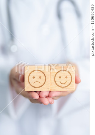 Doctor show Happy smile and Unhappy Sad face block, Mental health Assessment, Psychology, Health Wellness, Feedback, Customer Review, Experience, Satisfaction Survey, World Mental Health day concept 120693489