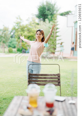 Happy woman with Dessert in cafe, young Asian girl smiling during eating cake and drinking ice beverage at home Happy woman with Dessert in cafe, young Asian girl smiling during eating cake and drinking ice beverage at home 120693651