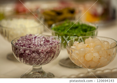 Experience the Vibrant World of Colorful Condiments and Fresh Ingredients for Cooking Delights 120694143