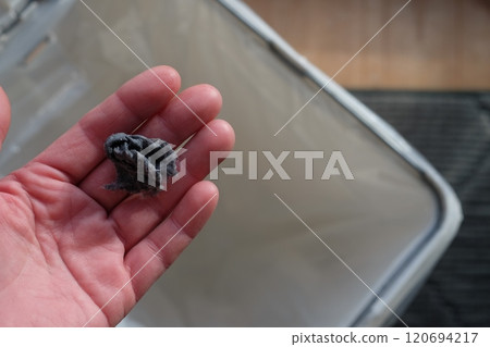 Throwing out trash 120694217