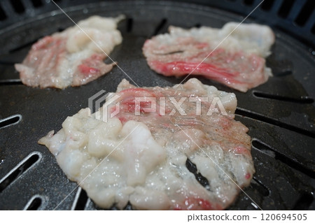korean style grilled beef on the hot grill korean style grilled beef on the hot grill 120694505