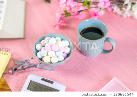 Coffee and a mountain of Ramune are prepared along with study materials. Coffee and a mountain of Ramune are prepared along with study materials. 120695544