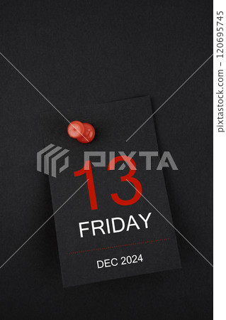 Calendar Friday the 13th December 2024 and push pin on black background. 120695745
