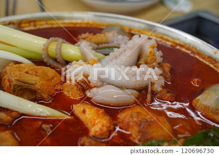 Spicy Korean stew with chicken and octopus 120696730