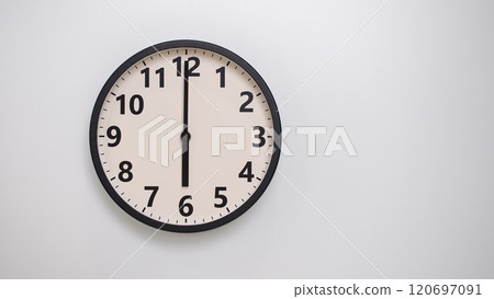 Classic Black-Edged Clock on White Background at 18.00/06.00 - Perfect for Time Management and Text Space 120697091