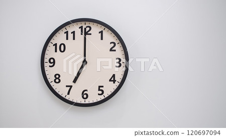 Classic Black-Edged Clock on White Background at 19.00/07.00 - Perfect for Time Management and Text Space Classic Black-Edged Clock on White Background at 19.00/07.00 - Perfect for Time Management and Text Space 120697094