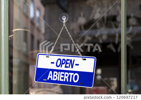 Open sign in Spanish and English Open sign in Spanish and English 120697217