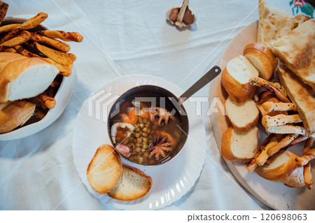 Seafood soup made with bread in kitchen 120698063