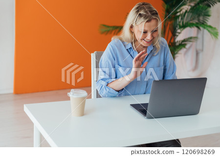 Business woman with laptop online working in office Business woman with laptop online working in office 120698269