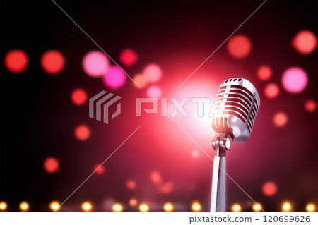 Vintage microphone stand and pink lighting 120699626