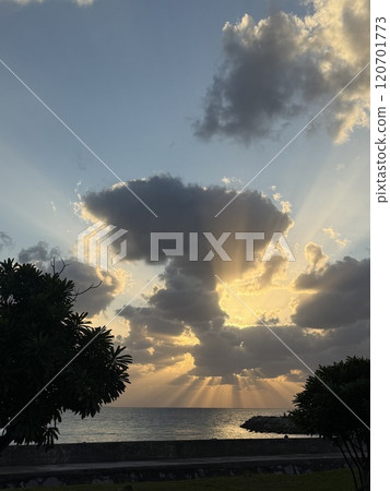 Sunset on the coastline of Nago City 120701773