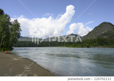 View of the mountains and the beach on the Katun River in the Altai Mountains View of the mountains and the beach on the Katun River in the Altai Mountains 120702212