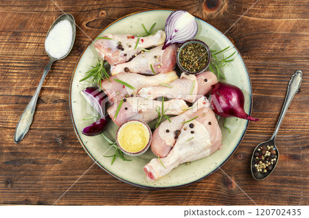 Raw chicken drumsticks. Raw chicken drumsticks. 120702435