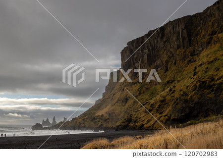 Mountain and rock formations in the ocean, Vik, Iceland Mountain and rock formations in the ocean, Vik, Iceland 120702983