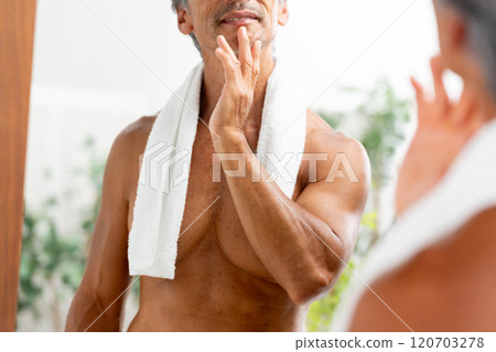 Man looking in the mirror Beauty Hands Man looking in the mirror Beauty Hands 120703278